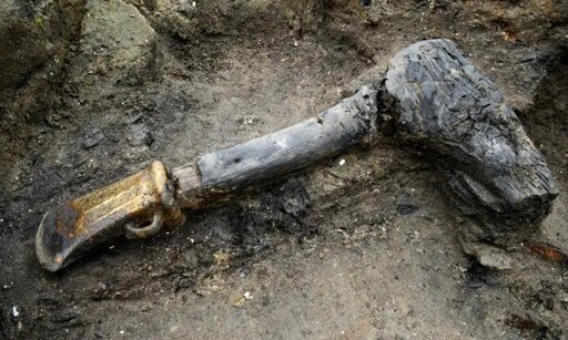 Axe with well-preserved wooden handle, England, ~850 BCE